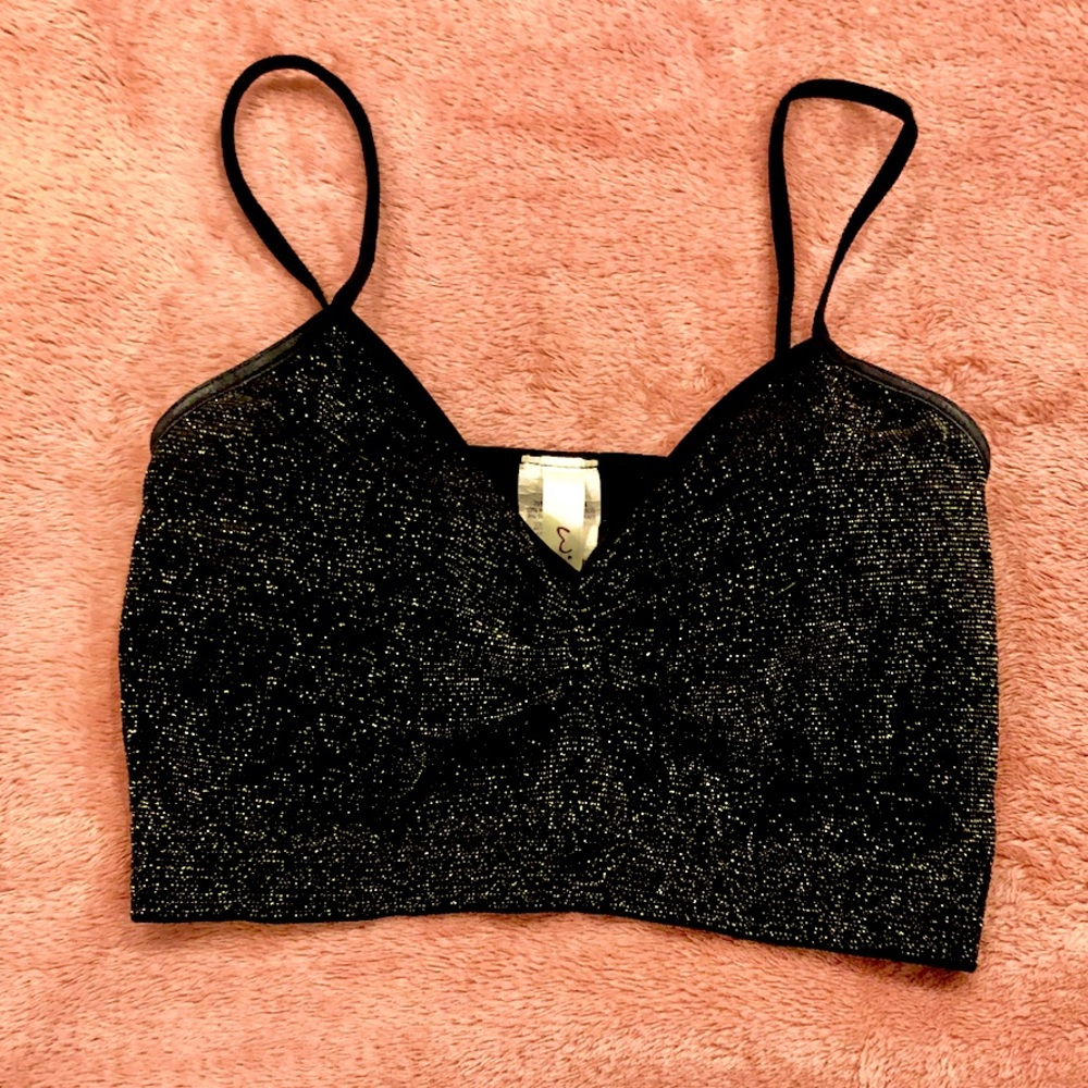 Black top with ✨gold✨sparkles on it.